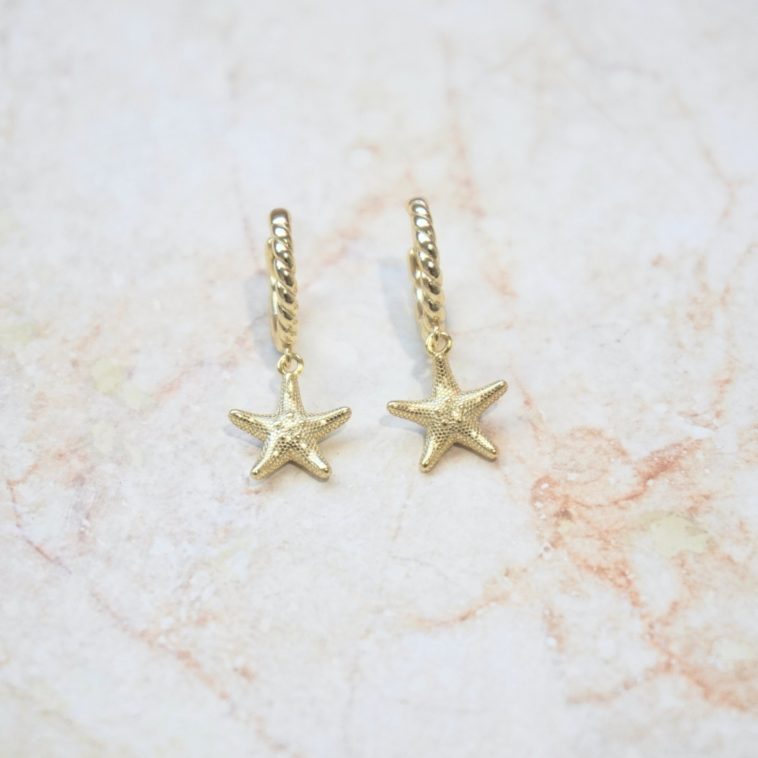 Seastar Starfish Gold Pendant Earrings flat lay. Waterproof Kailumea