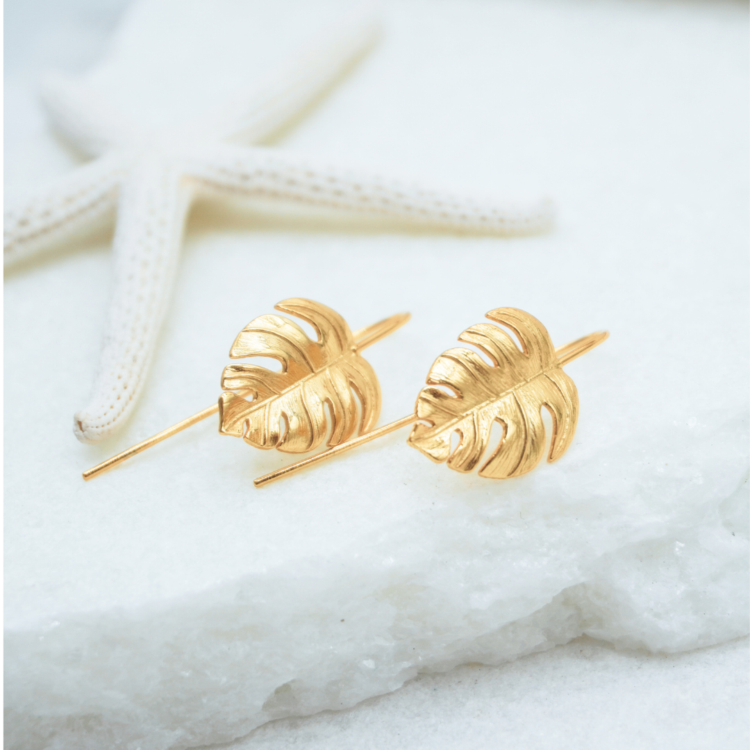 Gold Waterproof La Isla Threads Monstera Leaf Thread Earrings flat lay Kailumea