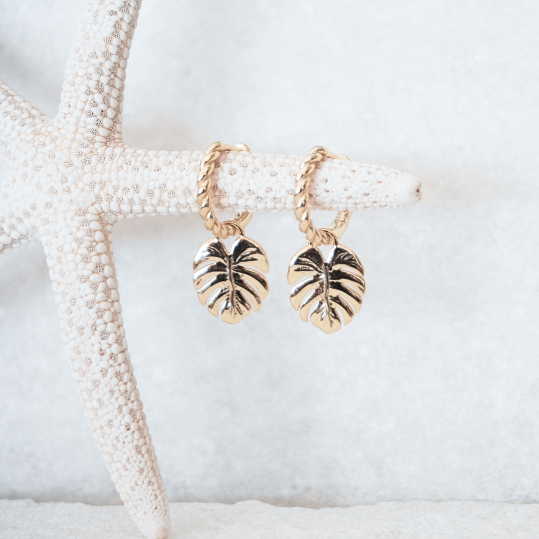 Mahina Gold Monstera leaf pendant hoop earring flat lay waterproof Kailumea