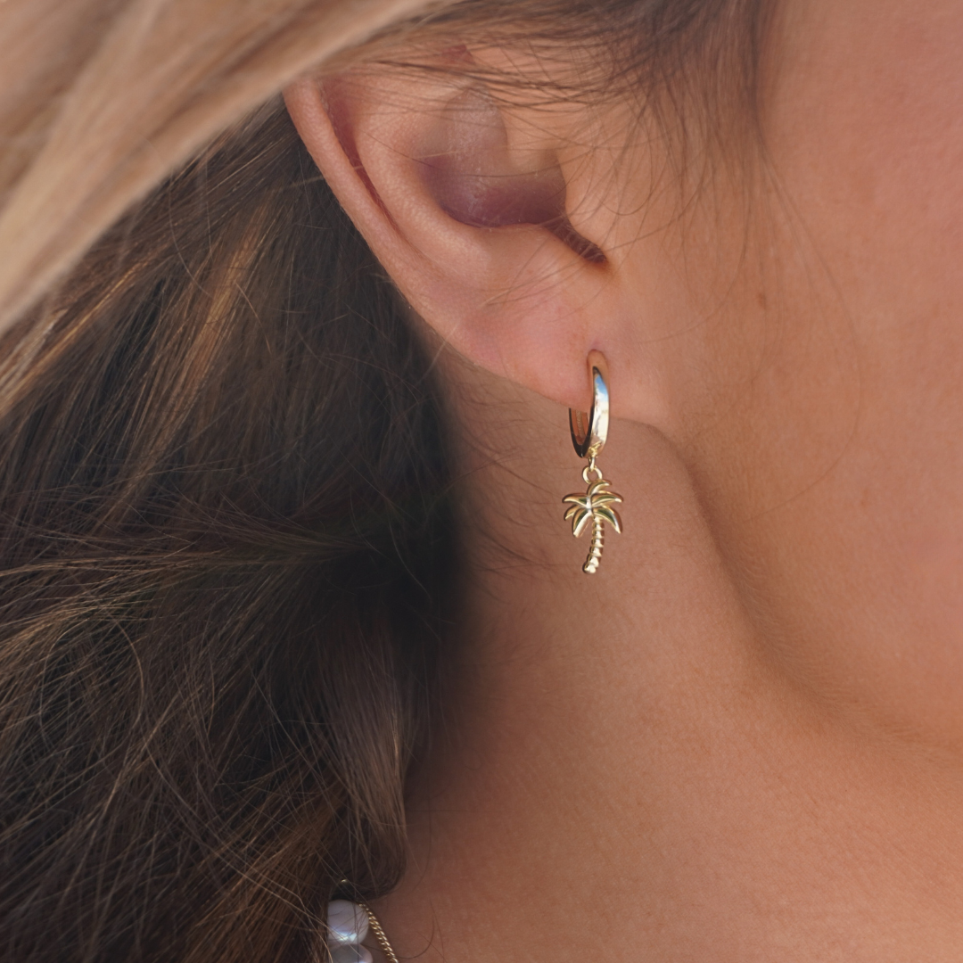 on ear close up palm tree earrings waterproof gold Kailumea