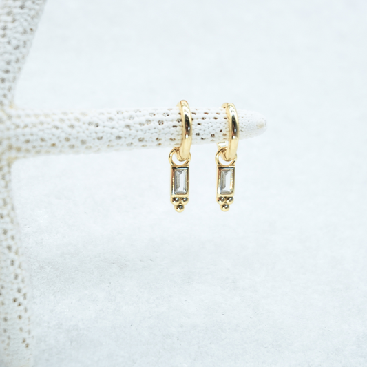 Pavana Gold Baguette Stone huggie hoop earring flat lay waterproof kailumea