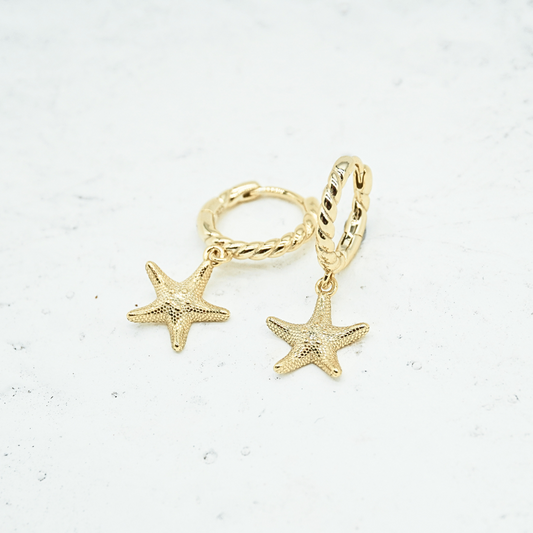 Seastar Starfish Gold Pendant Earrings flat lay. Waterproof Kailumea