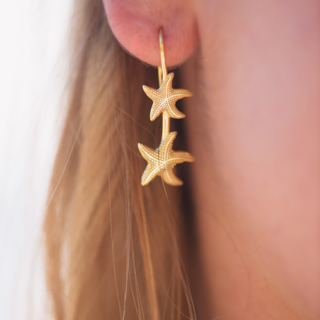 Close up in ear woman wearingStarla Starfish Gold Thread Earrings waterproof Kailumea 