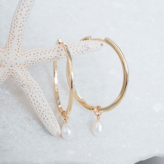 Waikiki Large Gold hoops with pearl charm pendant flat lay. waterproof Kailumea